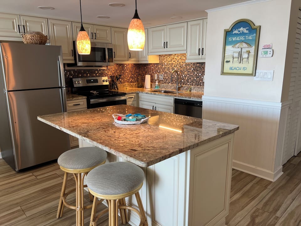 Beautiful totally new kitchen! Granite countertops, new cabinets and appliances.