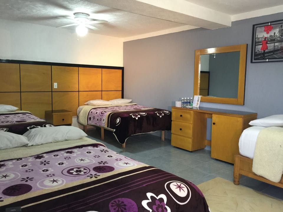 Family Room (7) | Blackout drapes, iron/ironing board, free WiFi, bed sheets