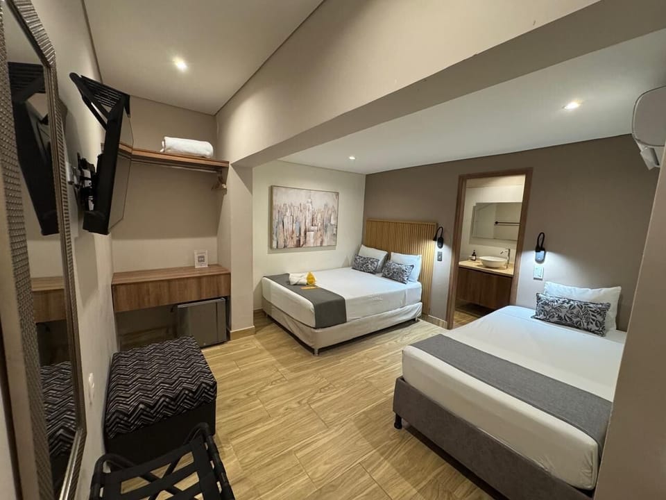 Superior Triple Room, Multiple Beds | Hypo-allergenic bedding, in-room safe, blackout drapes
