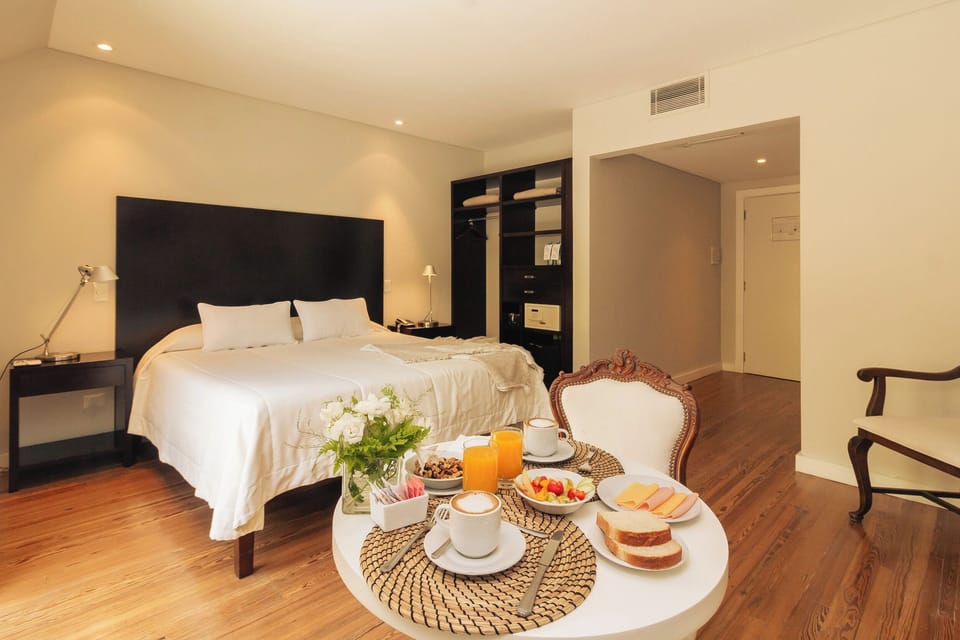 Executive Double Room | Minibar, in-room safe, blackout drapes, soundproofing