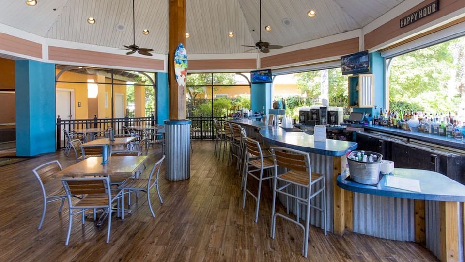 Tradeswind bar on property. Unwind, play, swim @ pool, order drink or grill item