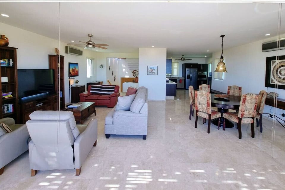 Relax in a comfortable living room with elegant decor and ample seating.