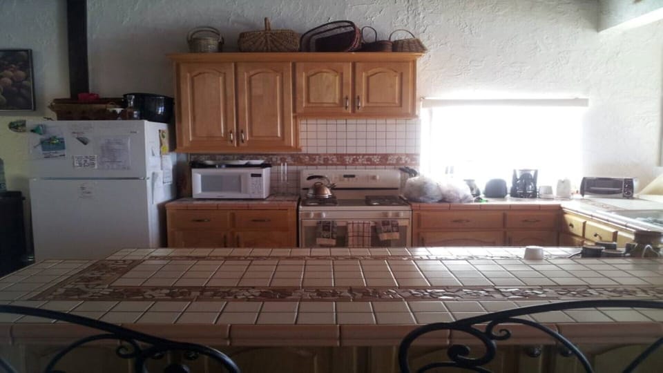 Kitchen fully equipped.  Great views!  Cubbord loaded with goodies help yourself