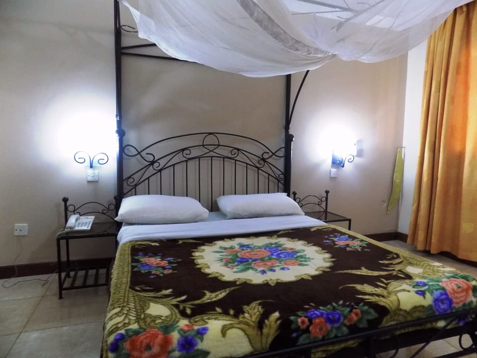 Desk, free WiFi, bed sheets