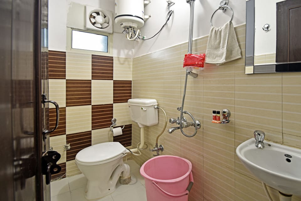 Shower, free toiletries, slippers, towels
