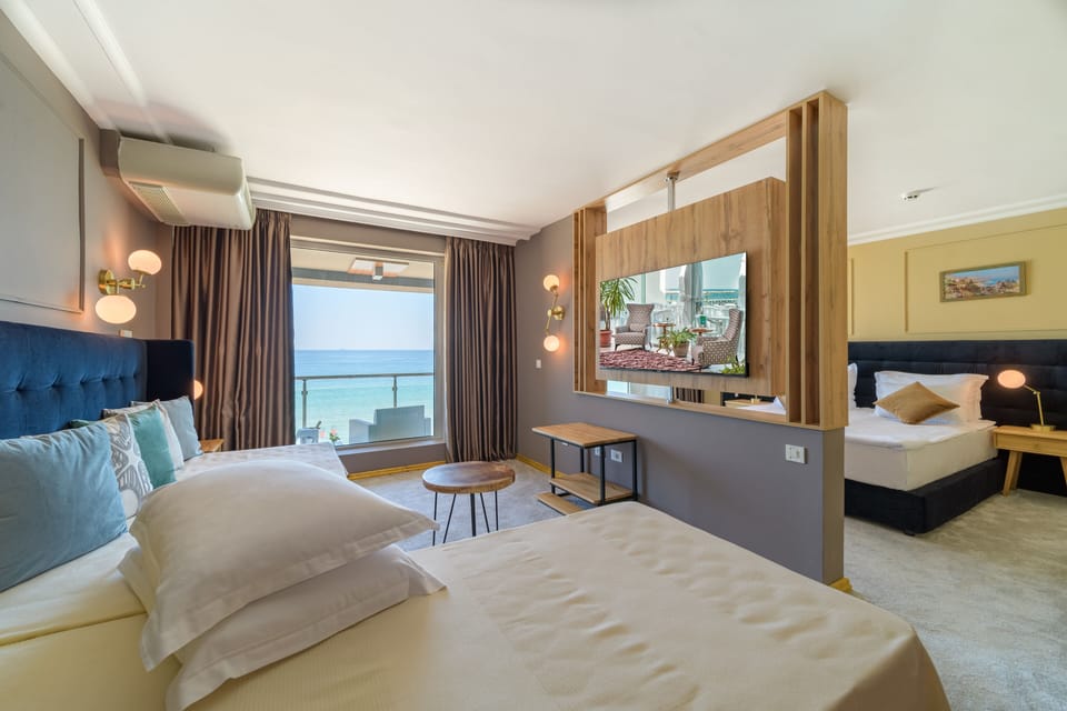 Family Room, Balcony, Sea View | Minibar, in-room safe, free cribs/infant beds, free WiFi
