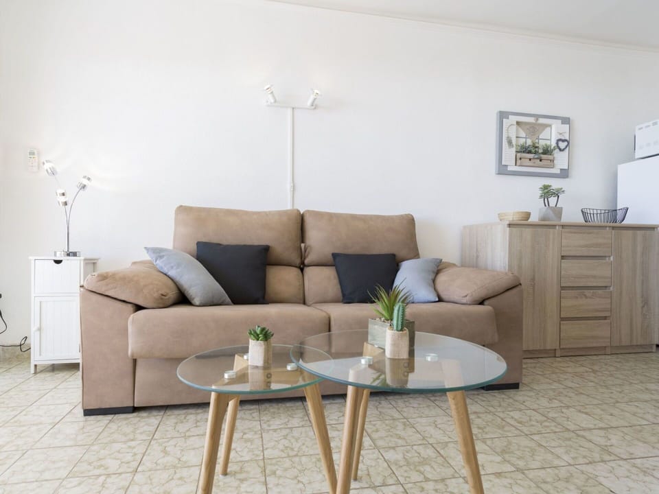 Living Room, Furniture, Room, Interior Design, Coffee Table, Property, Floor, Table, Couch, Wall
