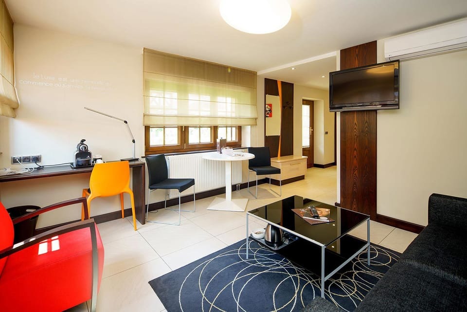 Family Suite, Terrace | Living area | TV