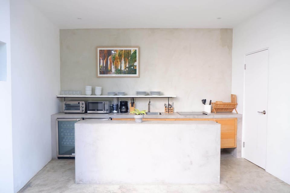 Full-size fridge, microwave, stovetop, coffee/tea maker