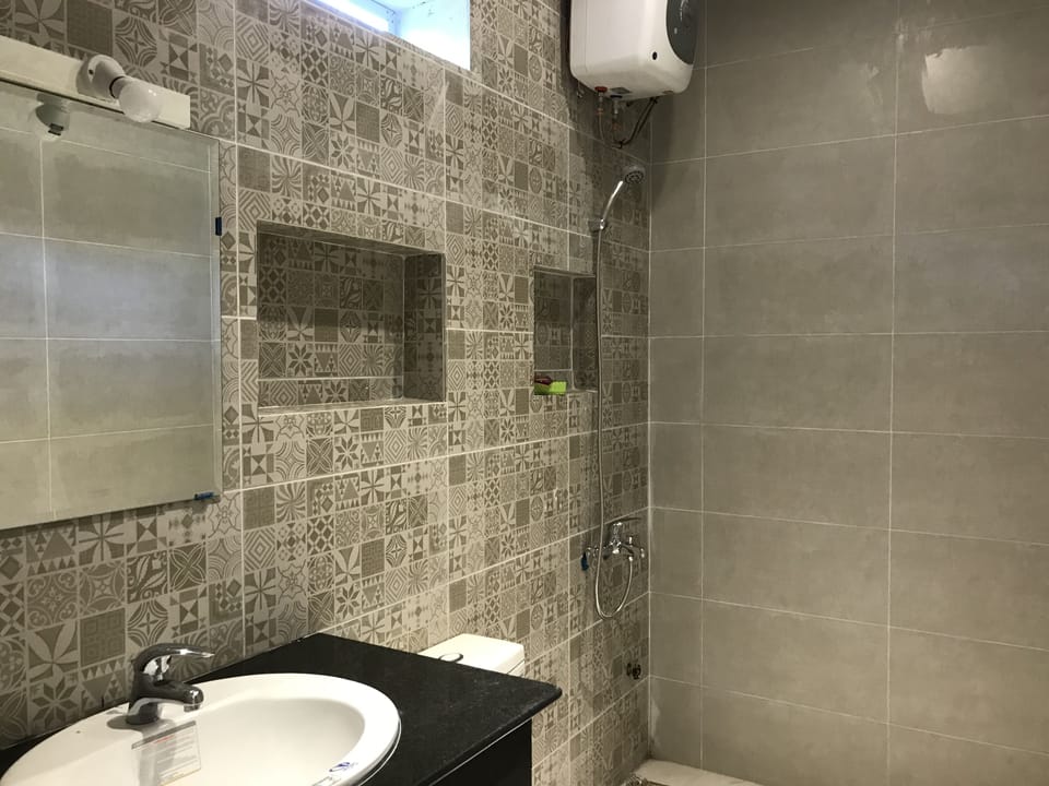 Standard Double Room | Bathroom | Shower, free toiletries, hair dryer, slippers