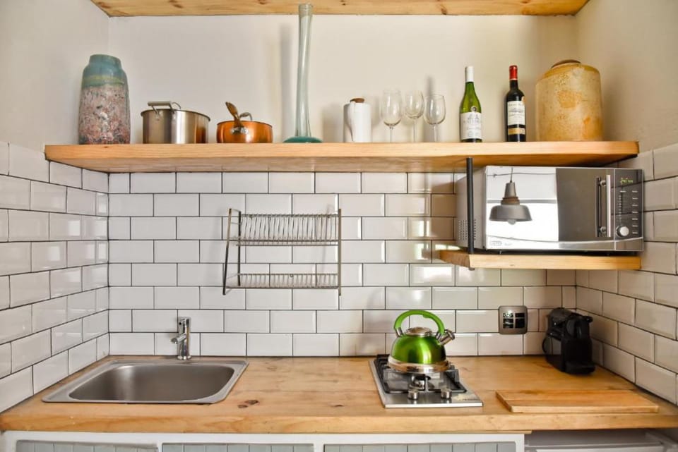 Luxury Suite, 1 Bedroom, Garden View, Courtyard Area (Fennel) | Private kitchen | Stovetop, espresso maker, electric kettle, toaster