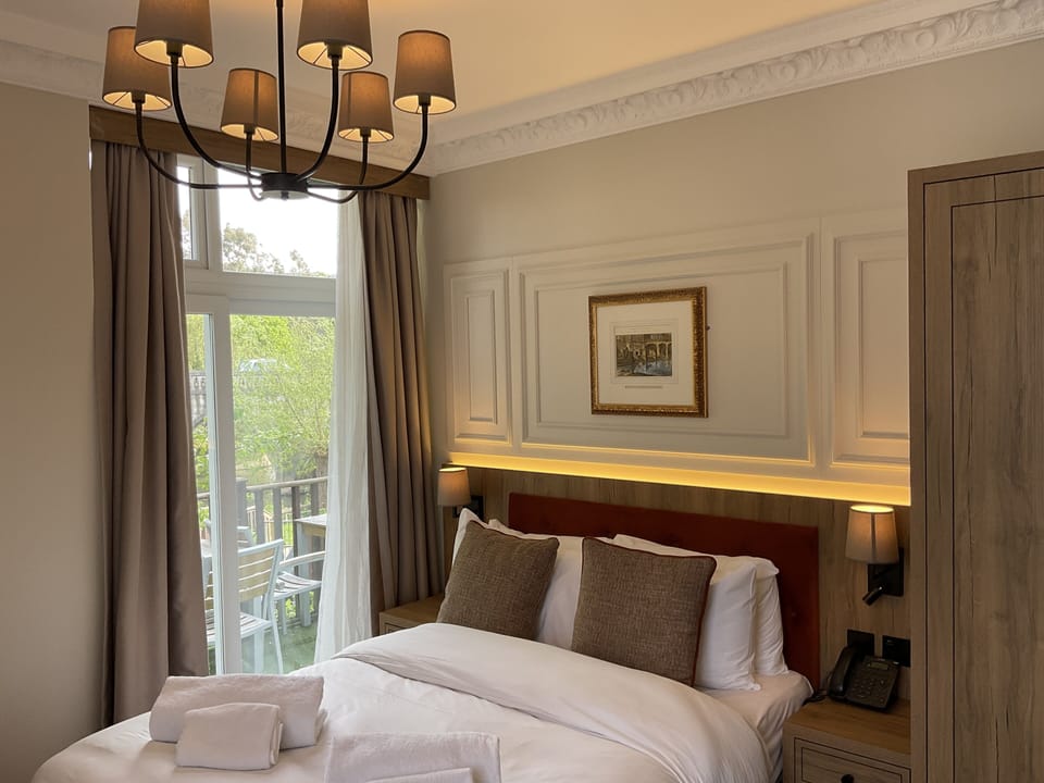 Superior Double Room | Individually decorated, individually furnished, desk, blackout drapes