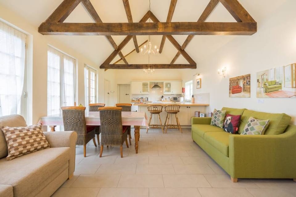 Comfortable seating area with television and two lovely sofas