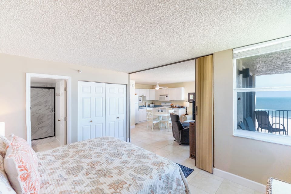 Bedroom has a view of the Gulf and a partition door for privacy if you have overnight guests on the sleeper sofa