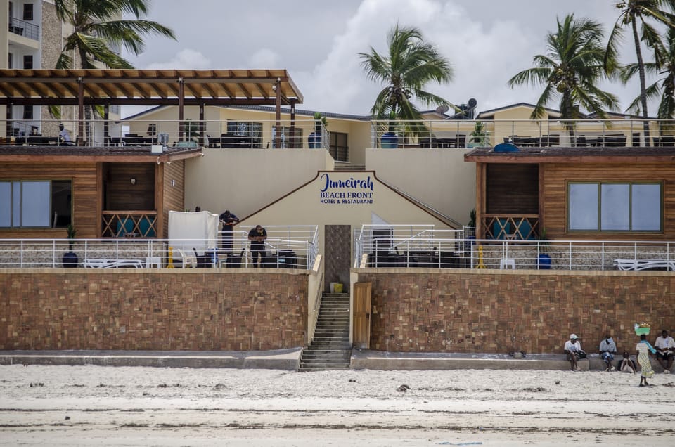 On the beach, white sand, sun loungers