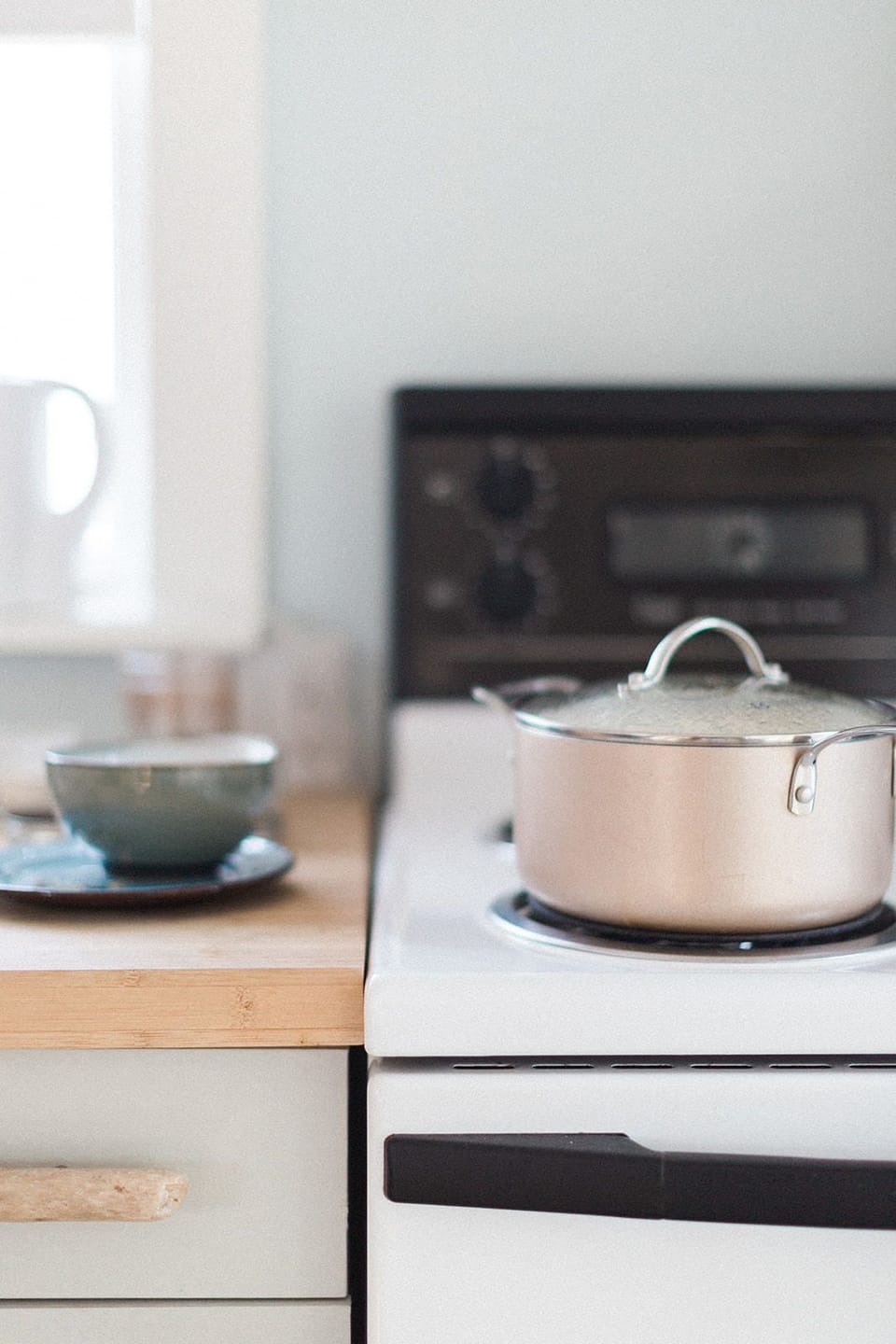 Sunfish Cottage | Private kitchen | Toaster, eco-friendly cleaning products, paper towels