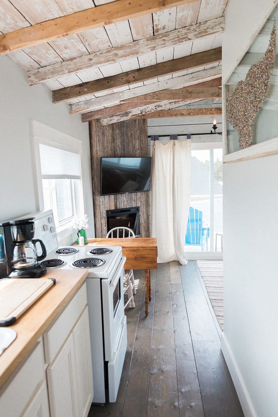 Starfish Cottage | Private kitchen | Toaster, eco-friendly cleaning products, paper towels