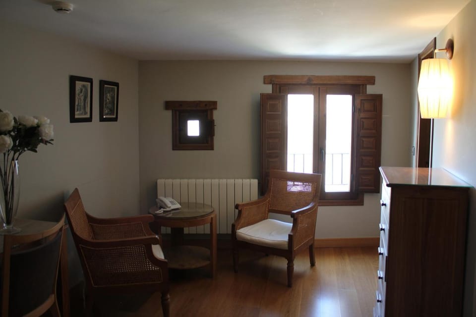Double Room, Mountain View | Living room | Flat-screen TV