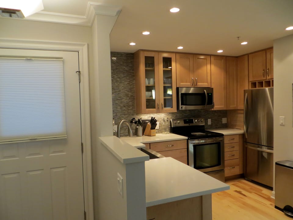 Welcome to a bright new contemporary condo on West Pearl Street.