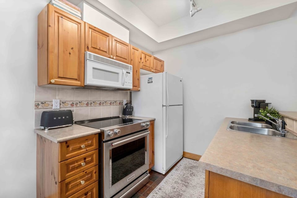Cook up a storm in the fully equipped kitchen with stainless appliances and ample counter space.
