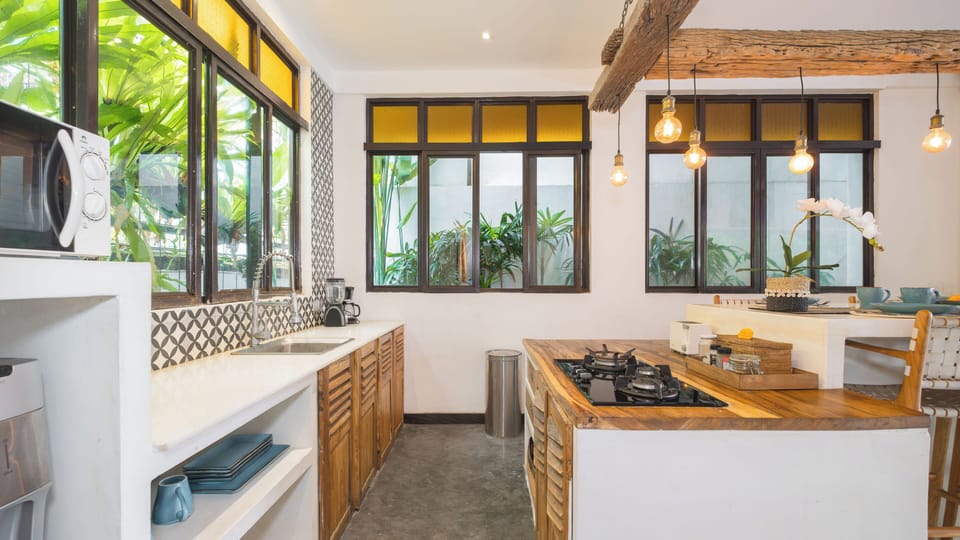 Family Villa, 4 Bedrooms | Private kitchen | Fridge, microwave, stovetop, coffee/tea maker