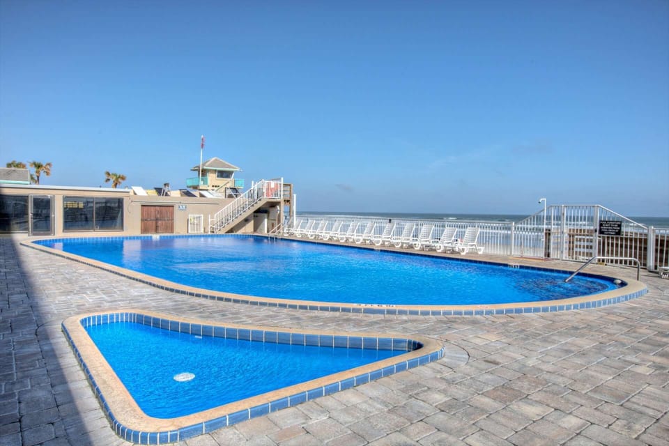 Kiddie and main pool located beachside for your enjoyment.**Refer to property description for open amenities.