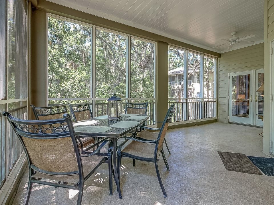 Screened Porch with Dining Table for Six at 8123 Wendover Dunes