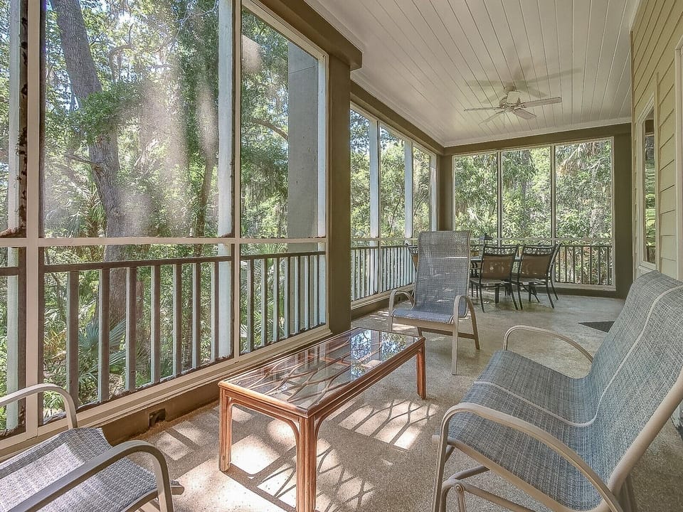 Sitting Area on Screen Porch at 8123 Wendover Dunes