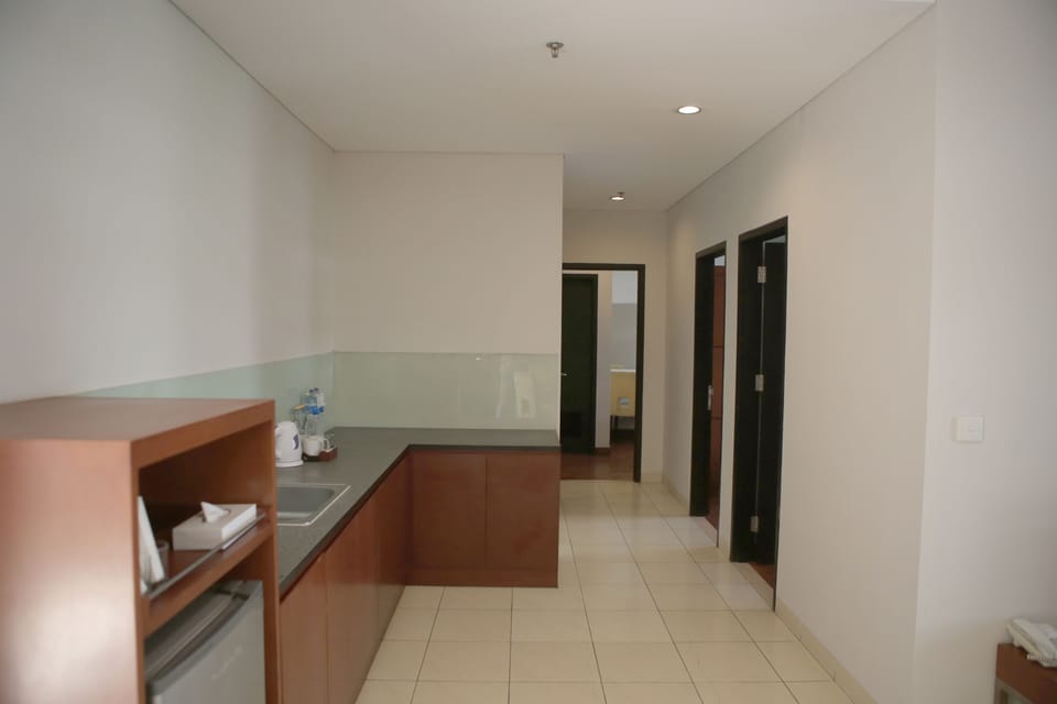 Executive Room, 3 Bedrooms | Living area | LCD TV