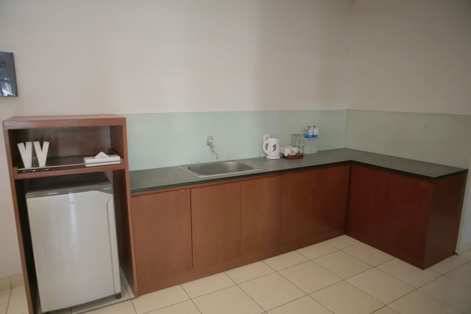 Executive Room, 3 Bedrooms | Living area | LCD TV