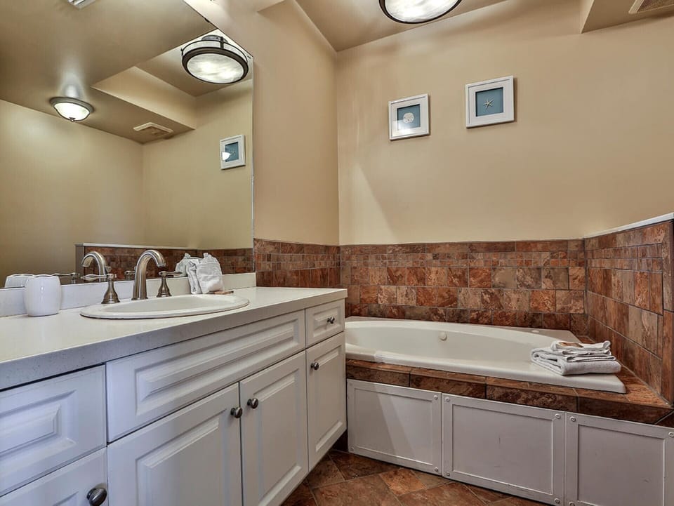 Relax in a large tub or take a quick shower after a fun day at the beach.