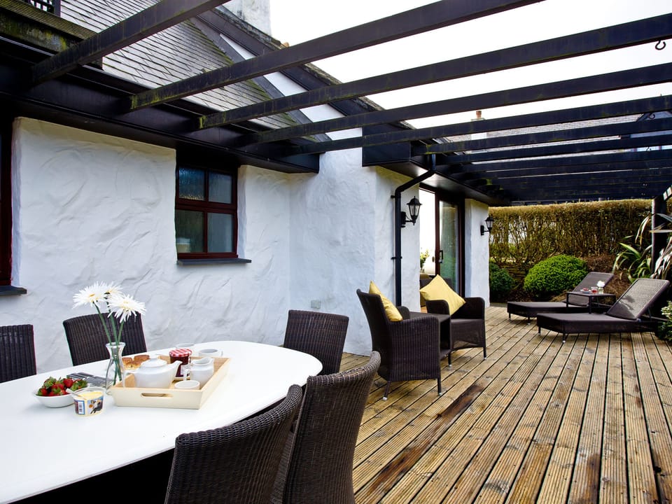 Wonderful relaxing decked area | Holly - Woodland Retreat, Wadebridge