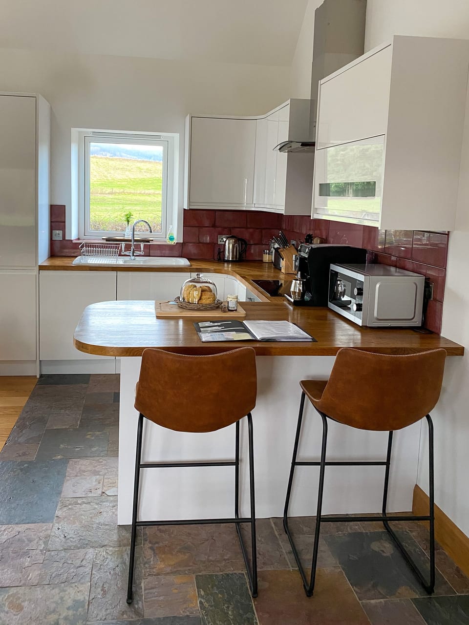 Kitchen island with bar stools