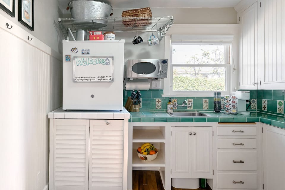 Your private kitchen includes half-fridge and all-in-one washer/dryer.