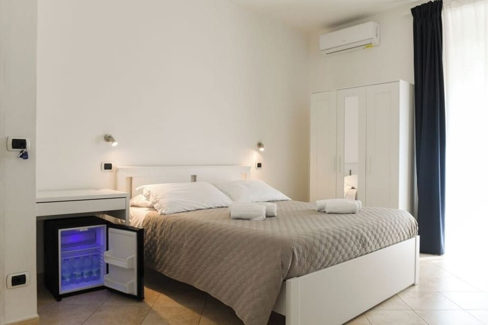 Quadruple Room, Balcony | In-room safe, blackout drapes, soundproofing, free WiFi