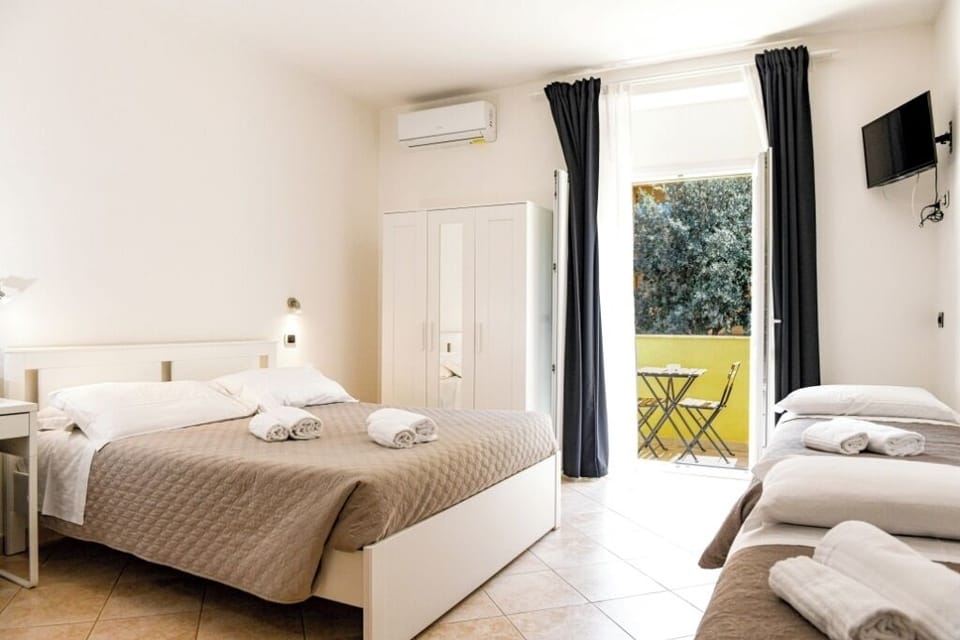 Quadruple Room, Balcony | In-room safe, blackout drapes, soundproofing, free WiFi