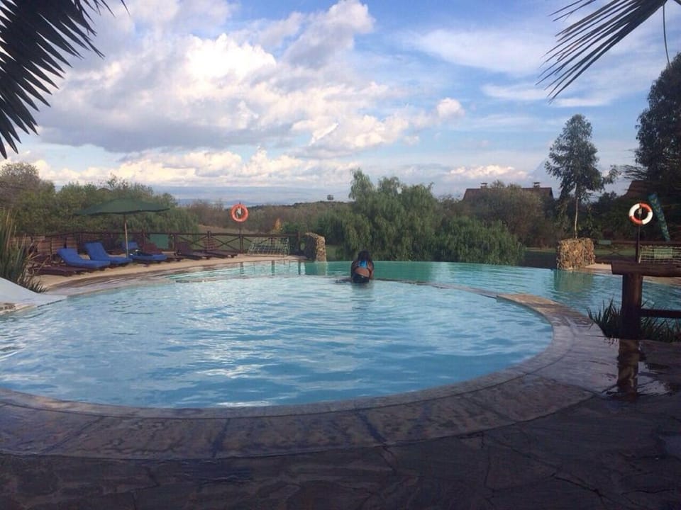 Outdoor pool, pool umbrellas, sun loungers