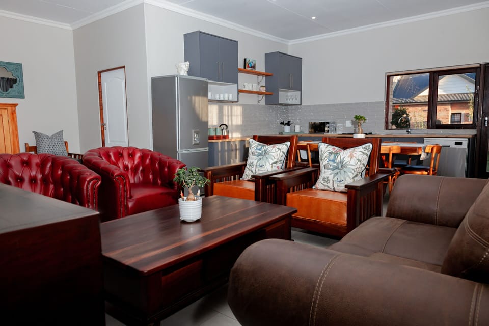 Comfort Apartment | Living area | 36-inch flat-screen TV with satellite channels, TV