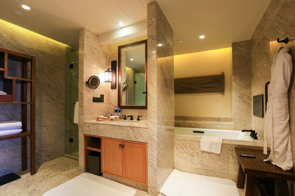 Executive Suite, Hill View | Bathroom | Separate tub and shower, rainfall showerhead, hair dryer, bathrobes