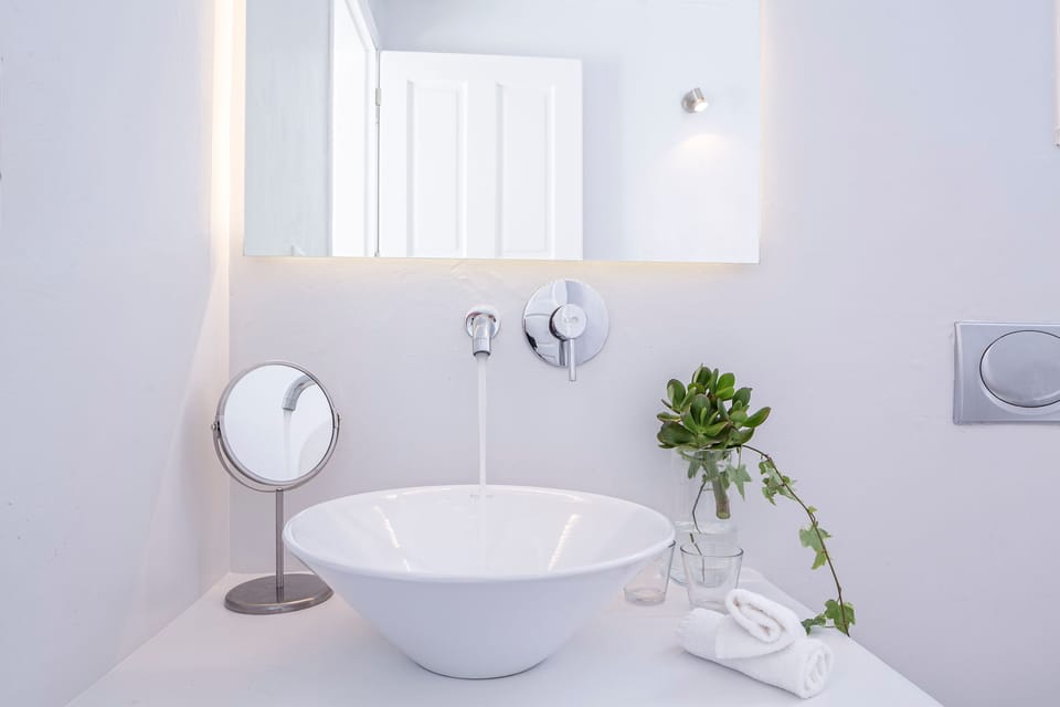 Shower, rainfall showerhead, designer toiletries, hair dryer