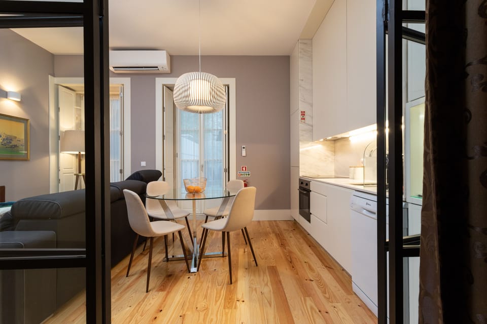 Deluxe Apartment, 1 Bedroom | Living area | 32-inch Smart TV with cable channels, TV, streaming services
