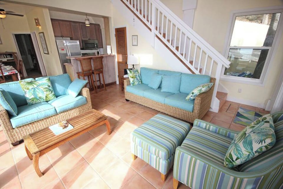 Your living room looking towards the kitchen & staircase to the upper level king bedroom