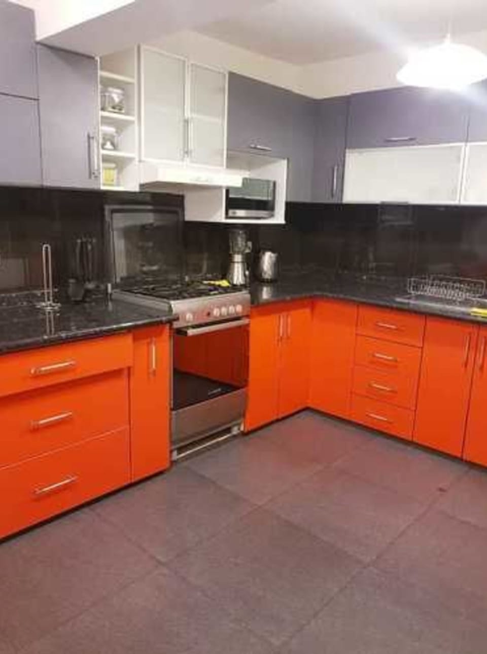Family Apartment, Multiple Beds | Private kitchen | Microwave, oven, stovetop, cookware/dishes/utensils
