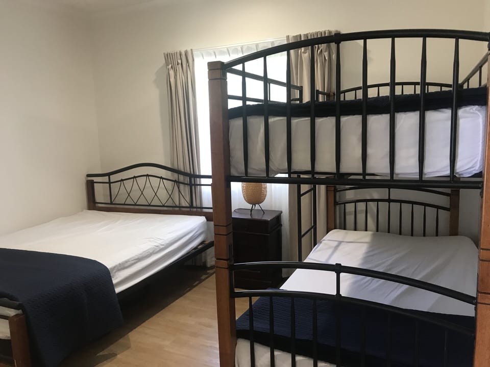 Bedroom 3. Bottom bunk is a king single mattress.