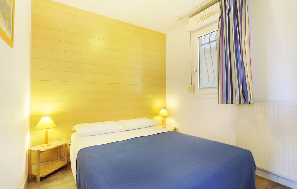 Get a peaceful night sleep in our cozy bedroom.