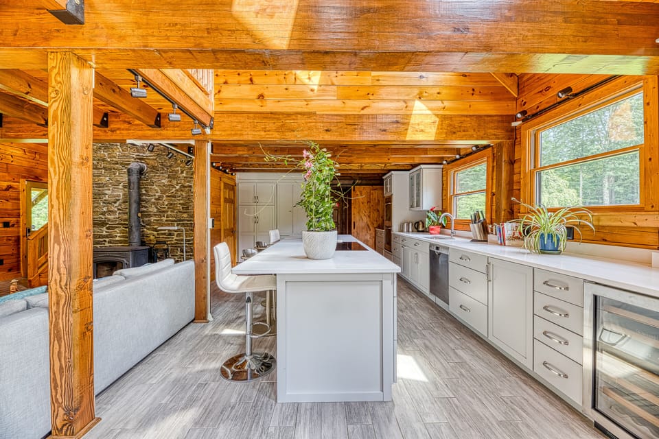 Kitchen island with 4 stools and induction cooktop & downdraft - a chef's dream!