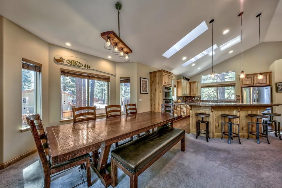 When dinner is hot and ready to be served  the dining table is just steps away  with seating for 6