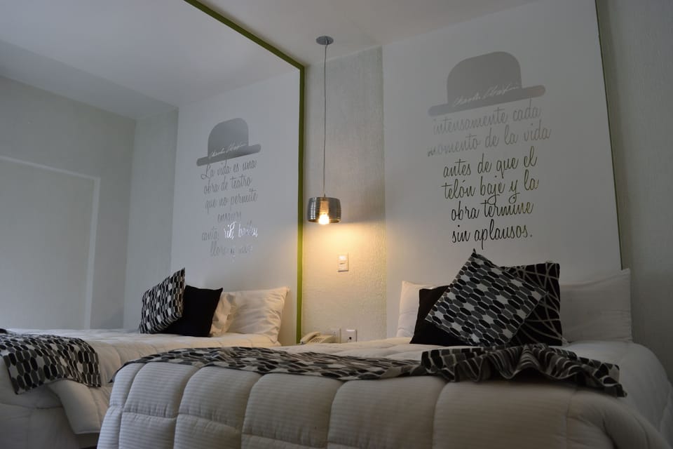 Business Room, 2 Double Beds | Down comforters, in-room safe, individually decorated, desk