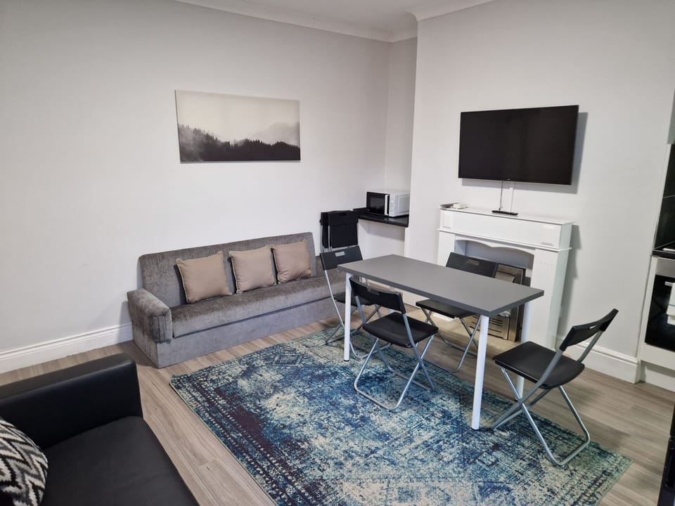 Apartment | Living area | 30-inch flat-screen TV with digital channels, TV