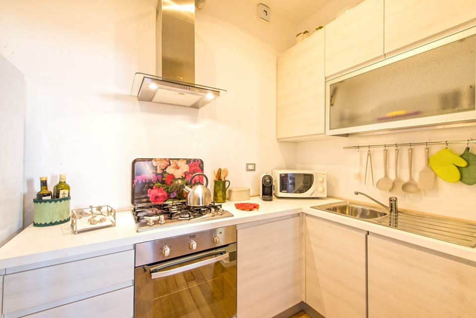 Design Apartment, 2 Bedrooms | Private kitchen | Full-size fridge, oven, stovetop, coffee/tea maker